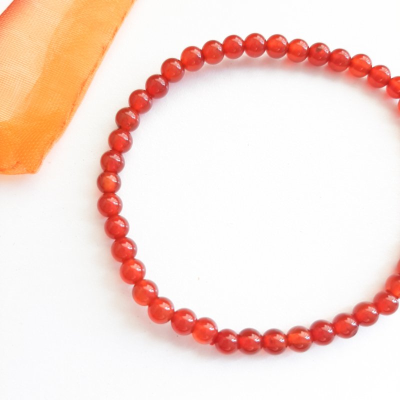 edelsteen-armband-4mm-in-zakje-carneool